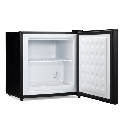 Black subcold eco35f mini freezer with white interior single shelf and ice cube tray on the door