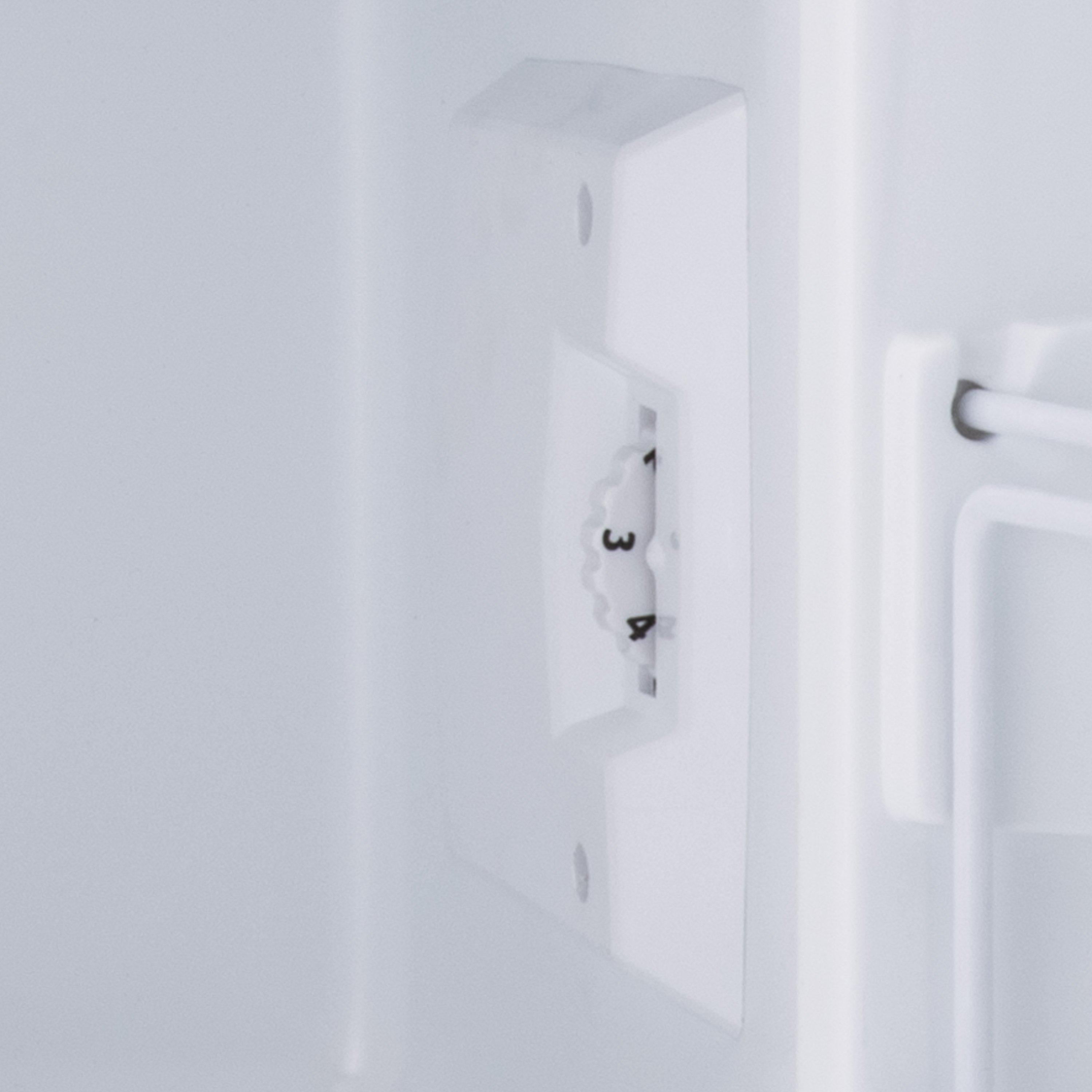 White plastic temperature control dial with black numbers on the subcold eco75 table top fridge