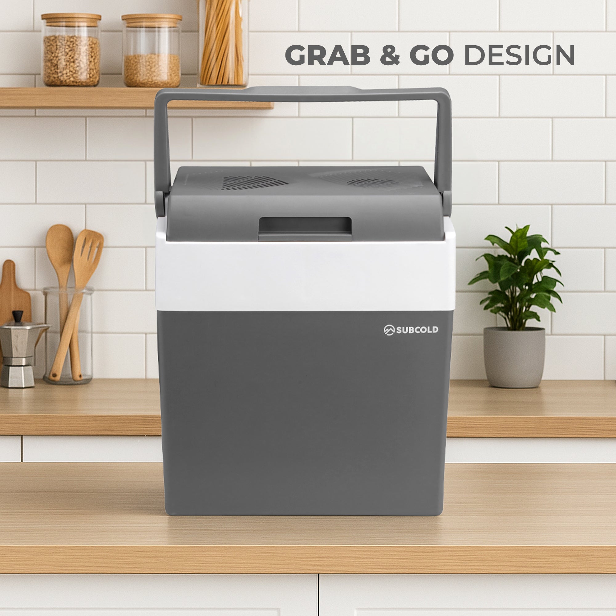 Gray and white subcold euro30 cool box with handle for easy carrying portable thermoelectric cool box