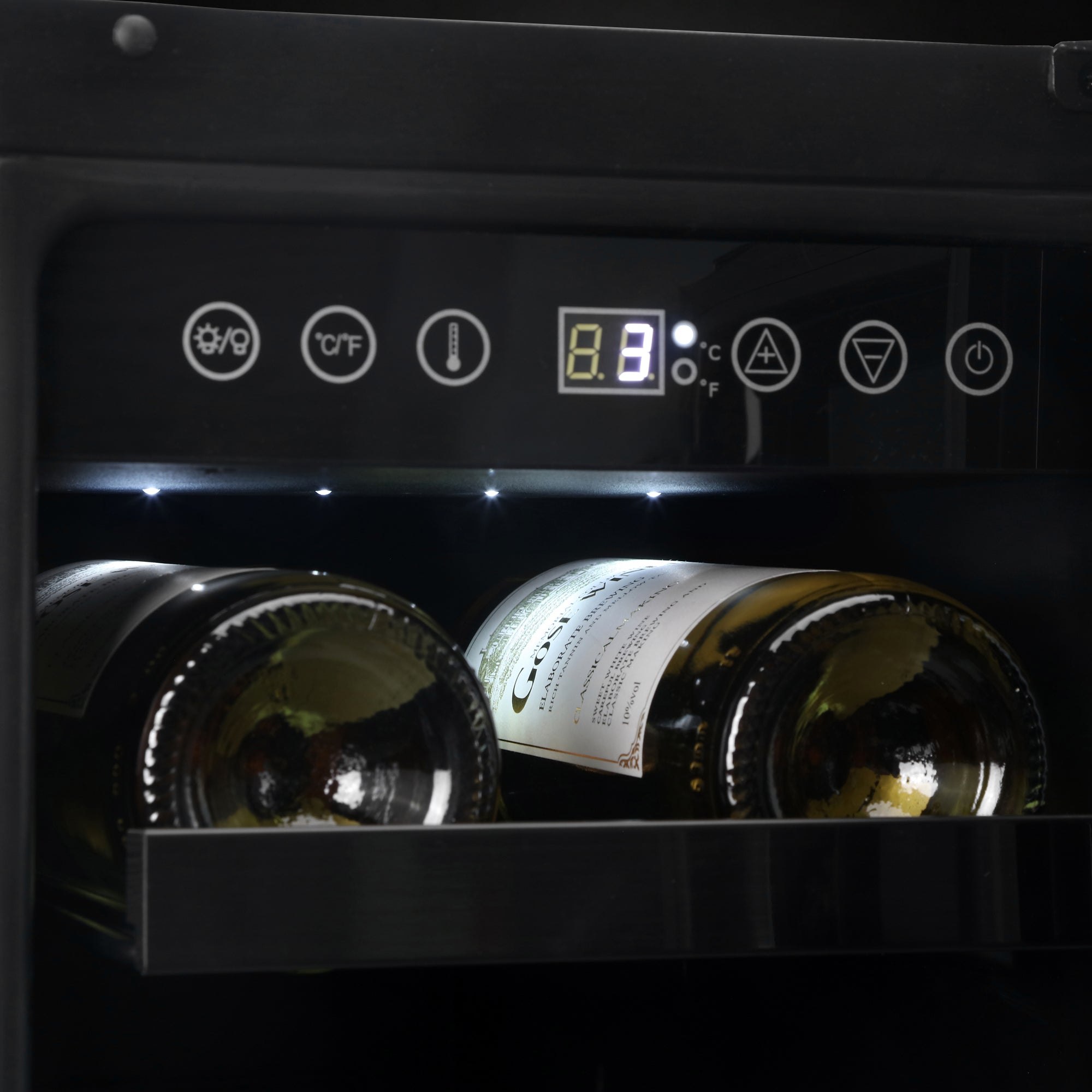 Black digital subcold integra30 wine cooler with illuminated panel showing 8.3°c and two perfectly chilled bottles inside