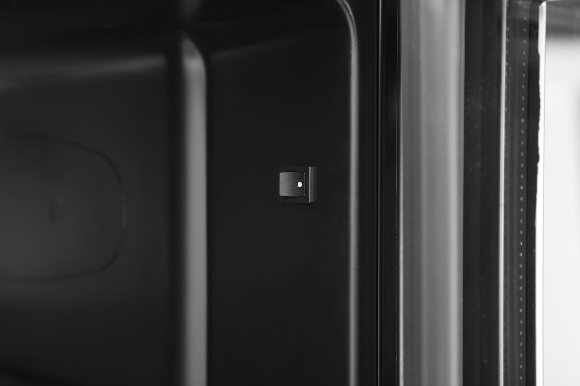 Black rectangular sensor with white dot on the side of subcold maxi250led tall drinks fridge black appliance