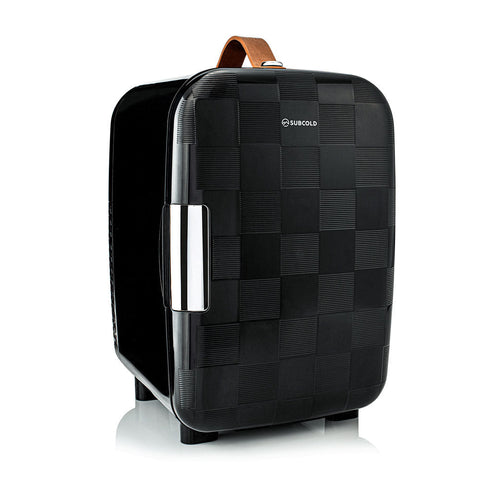 Black subcold pro 10l mini fridge with textured checkered pattern chrome handle and brown leather top carry strap
