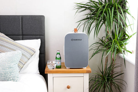 Gray subcold pro 10l mini fridge with white trim and brown leather handle compact 10l mini fridge perfect for small spaces