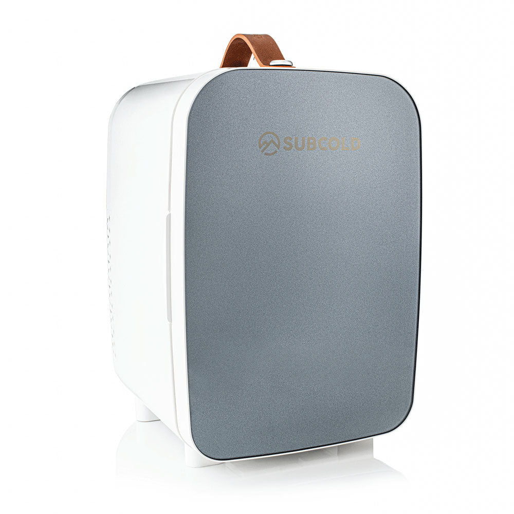 Subcold Pro 10l mini fridge in gray and white with a brown leather handle portable 10l mini fridge