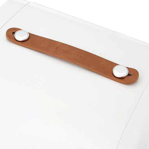 Tan leather strap with silver snap buttons on suncoold subcold pro 10l mini fridge for easy carrying