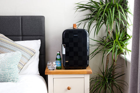 Black checkered subcold pro 15l mini fridge with tan leather handle and silver hinge perfect for small spaces