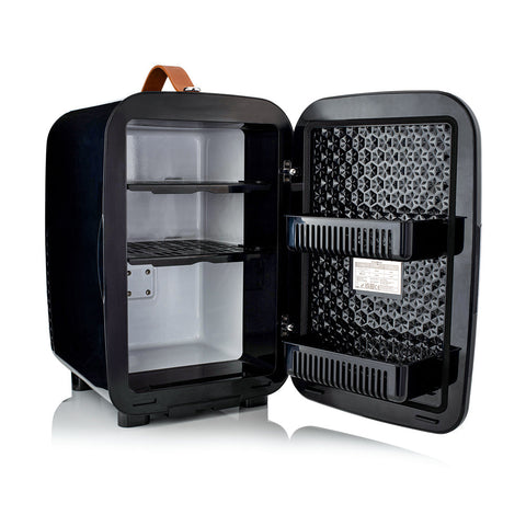 Black Subcold pro 15l mini fridge with brown leather handle and interior shelves perfect for compact cooling