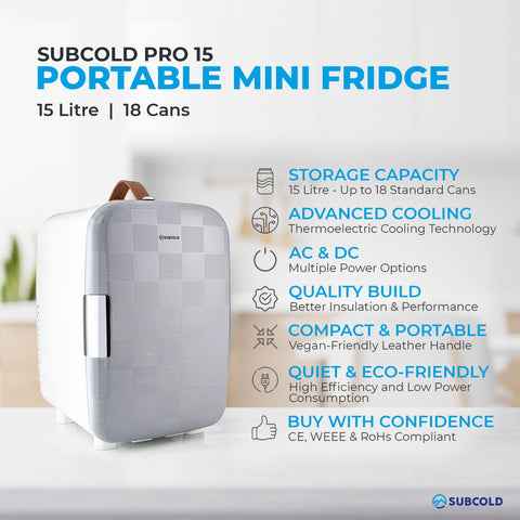 Silver textured subcold pro 15l mini fridge with brown leather handle and metallic door latch perfect for small spaces