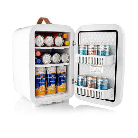 White subcold pro 15l mini fridge with brown leather handle and shelves stocked with canned beverages