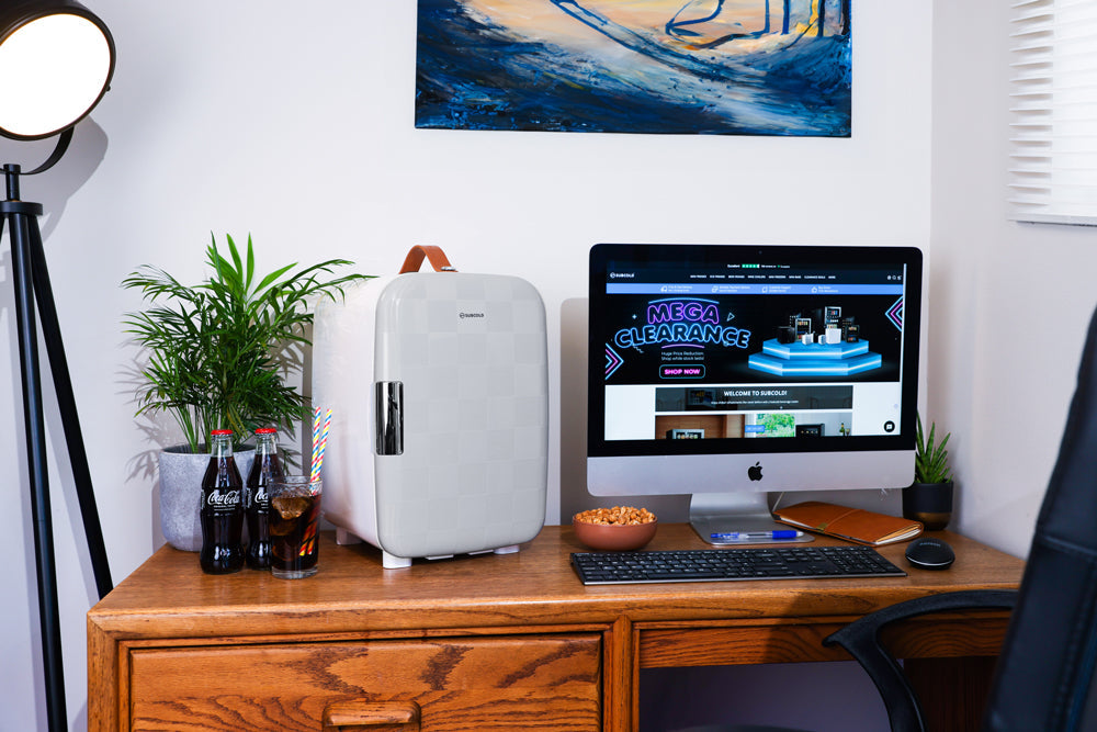 White subcold pro 15l mini fridge with brown leather handle and silver vertical accent perfect compact 15l mini fridge