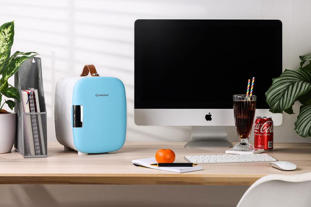 Light blue and white subcold pro 4l mini fridge with brown leather handle compact mini fridge for small spaces
