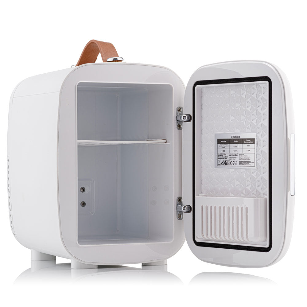 White subcold pro 4l mini fridge with tan leather handle silver hinges interior shelf and ventilation grille