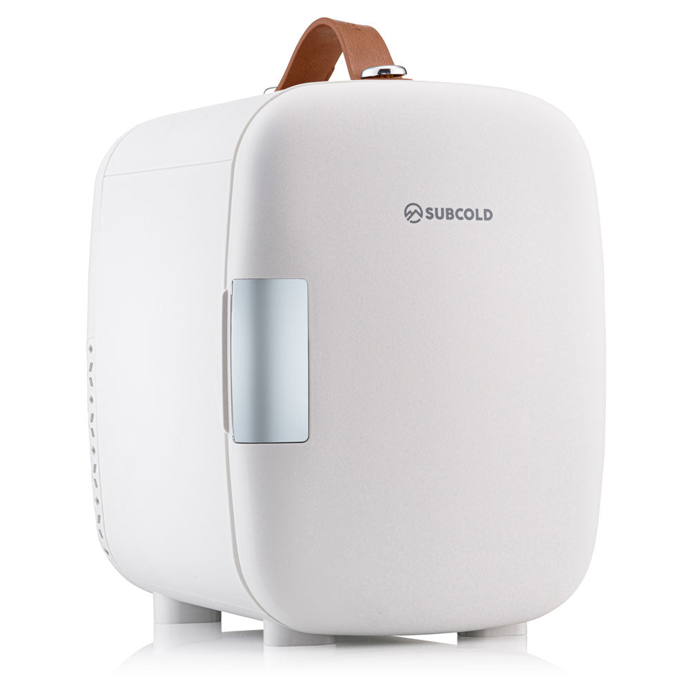 White subcold pro 4l mini fridge with brown leather handle and silver door latch perfect for small spaces