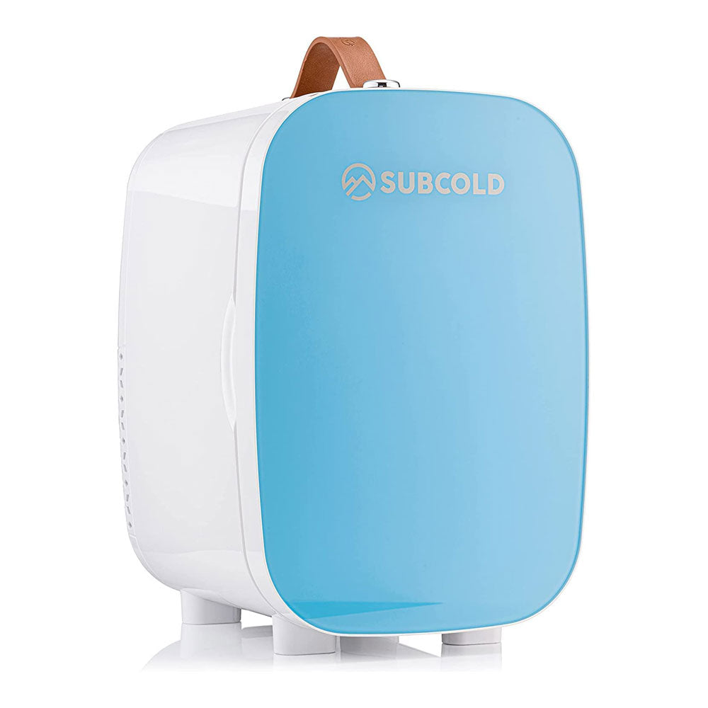 Light blue and white subcold pro 6l mini fridge with brown leather handle and removable shelf for larger items