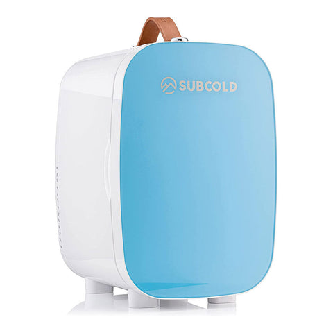 Light blue and white subcold pro 6l mini fridge with brown leather handle and removable shelf for larger items