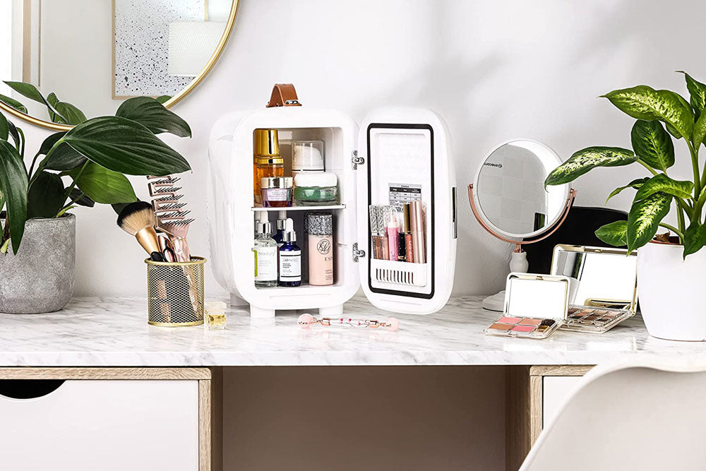 White subcold pro 6l mini fridge with mirror door and brown leather handle featuring removable shelf for larger items