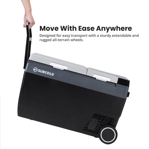 Black and gray subcold roam-45dz portable car fridge with extendable handle and rugged all-terrain wheels
