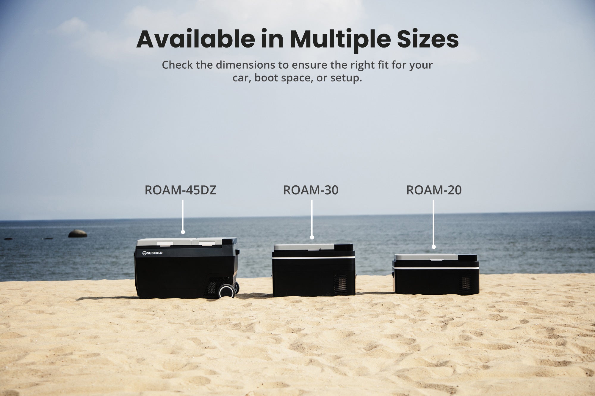 Black subcold roam-30 portable car fridge with silver accents and wheels for easy storage and transport