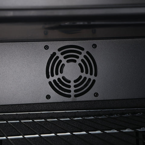 Black circular ventilation grille with concentric rings on matte metal panel at back of subcold super led beer fridge