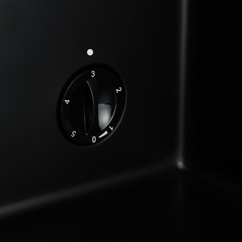 Black rotary dial with white numbers and illuminated dot on glossy finish subcold super drinks fridge control panel
