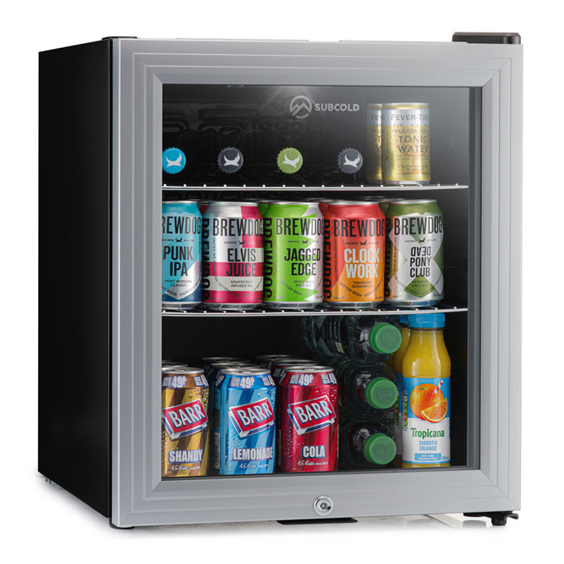 Silver-framed subcold super50 led beer fridge with black sides and glass door stocked with colorful drinks cans and bottles