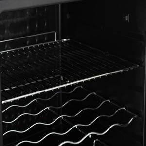 Black oven interior with metal racks and wavy wire wine rack inside the subcold super65 drinks fridge