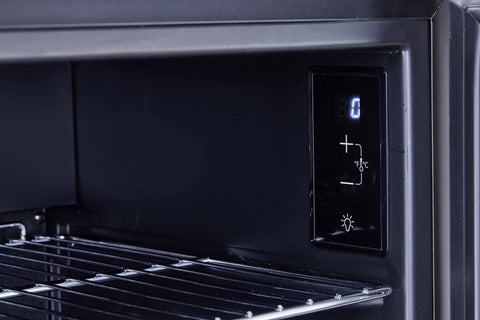Black digital control panel with illuminated display and temperature buttons on subcold super85 led beer fridge