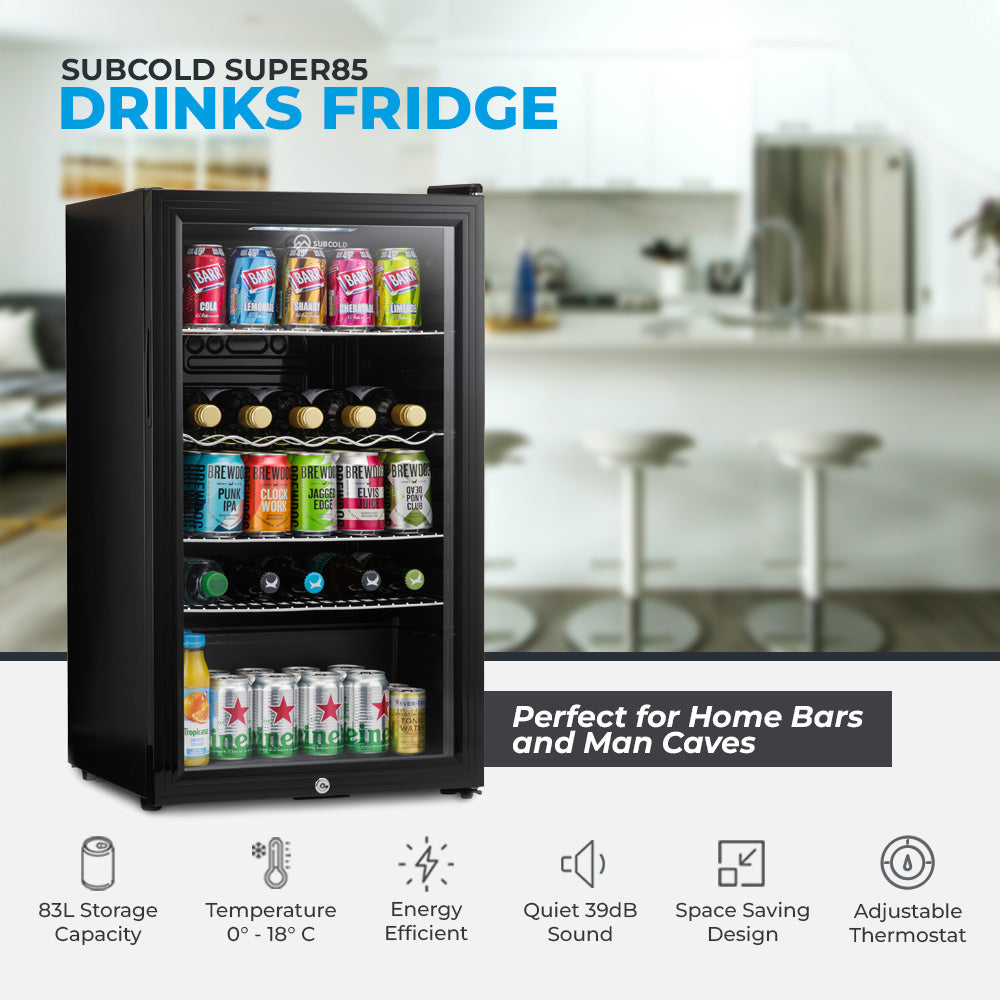 Black subcold super85 led beer fridge with glass door and shelves stocked with colorful canned beverages