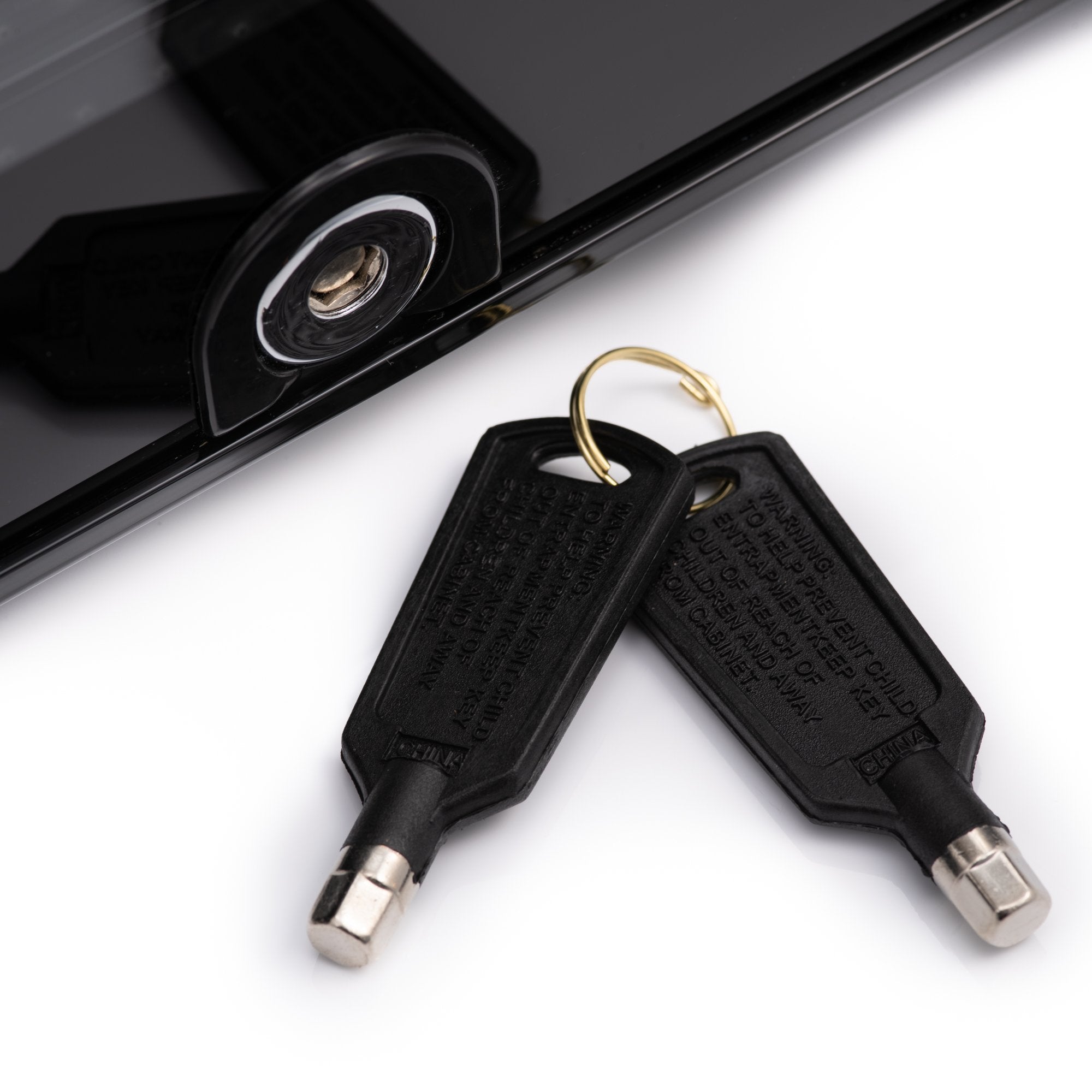 Black plastic car keys with silver tips and gold ring for subcold viva24 led wine cooler access and security