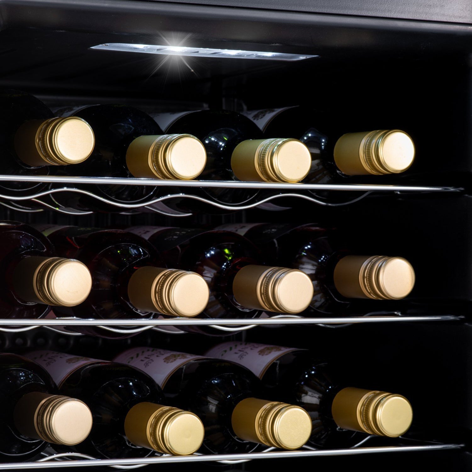 Black subcold viva28 led wine cooler with silver wire shelves holding red wine bottles in wine fridge