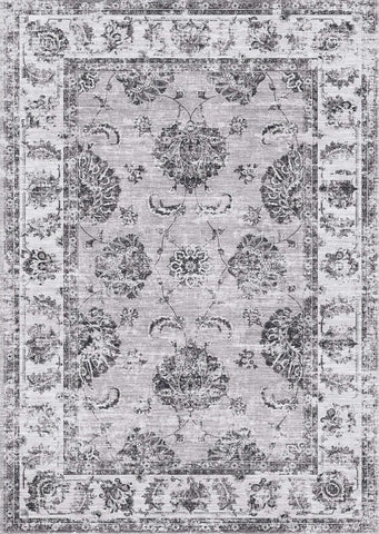 Sulus vintage washable rug with faded gray and black floral pattern on textured distressed background vintage washable rug