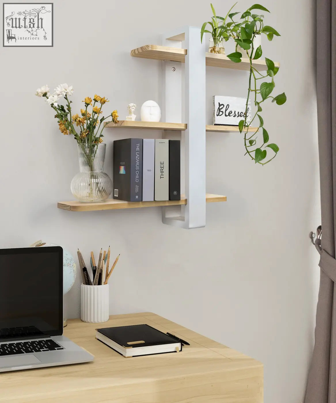 Light wood pine wood floating shelves with white supports holding books and decor for living room wall mounting