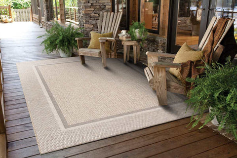Beige woven summer latte border outdoor rug with a subtle gray latte border for indoor and outdoor use
