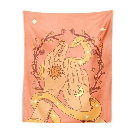 A peach moon tapestry with two hands showing sun and moon designs wrapped in a golden snake and stars