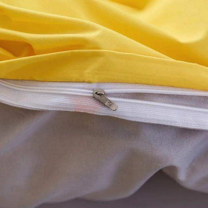 Bright yellow duvet cover from sun & stars bedding set with white zipper closure for a flat bed setup