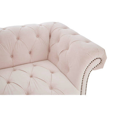 Soft blush pink blossom fabric chesterfield sofa with tufted leather and dark nailhead trim for elegant seating