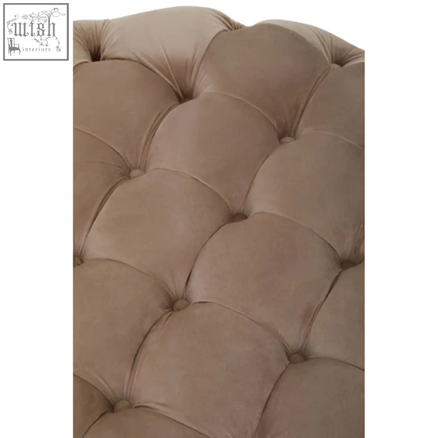 Beige tufted velvet headboard with classic button design paired with the suri round stool for cozy style