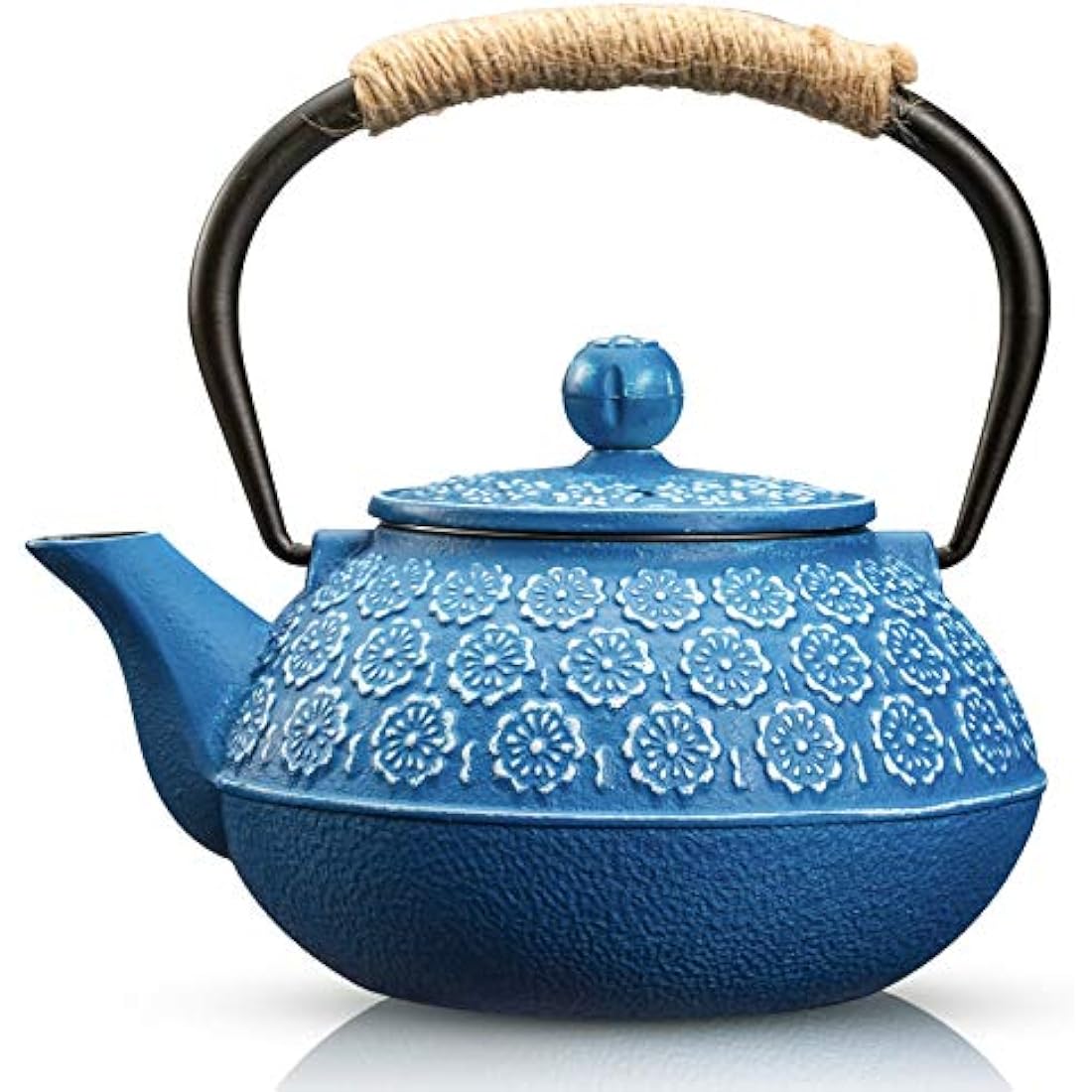 Dark blue susteas cast iron teapot with white floral embossing and twine wrapped handles for loose leaf tea brewing