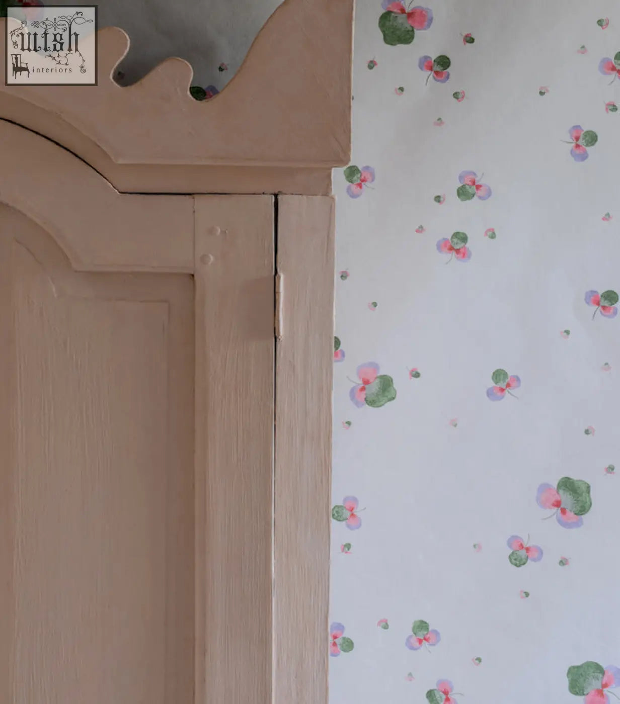 Light pink wooden wardrobe with scalloped top edge made from ethically sourced materials inspired by sweet clover three leaves