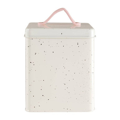 Cream-colored speckled metal sweet heart large storage canister with a pink handle for kitchen or home use