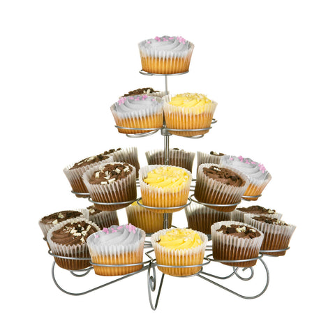 Silver tier wire cupcake stand with four swirl chrome tiers holding assorted cupcakes in paper cups