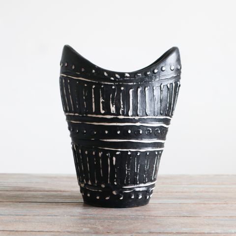 Black ceramic vase with white geometric swirls shaped patterns and dotted accents for dry flowers vase chocolate