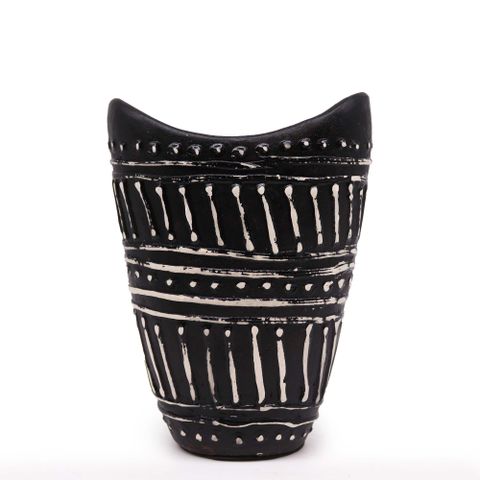 Black ceramic swirls shaped vase with white geometric patterns and dotted accents for dry flowers in chocolate tone