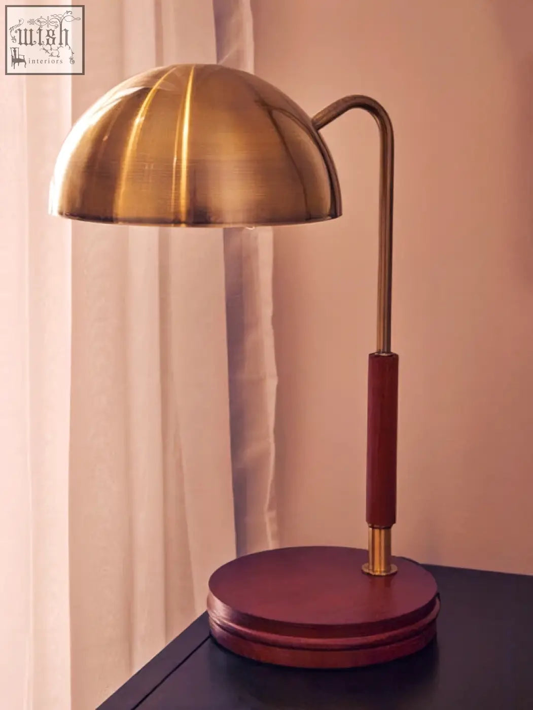 Sydnee antique brass finish task lamp with curved stem and wood base perfect for focused lighting