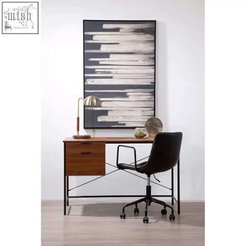 Mid-century modern desk with warm wood top and metal frame shown with sydnee antique brass finish task lamp with wood base