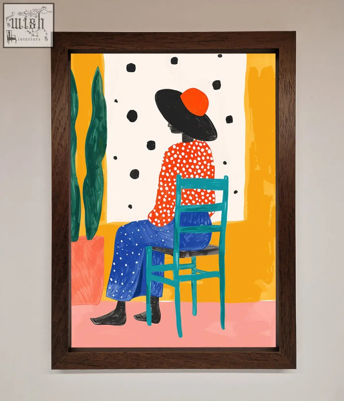 A vibrant seat framed poster featuring a figure in orange polka-dot top and blue pants on a teal chair in dark wood frame