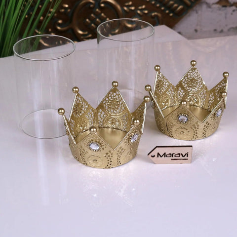 Gold-colored talika crown candle holder set of 2 with intricate pierced metal design and clear gemstone accents