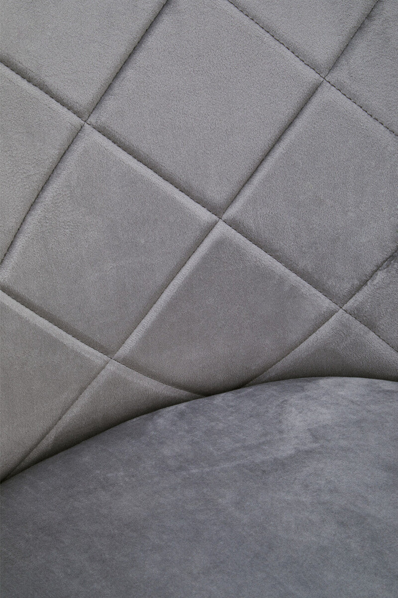 Gray quilted fabric with diamond pattern on the back of tamzin mink velvet splayed dining chair seat