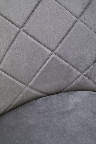 Gray quilted fabric with diamond pattern on the back of tamzin mink velvet splayed dining chair seat