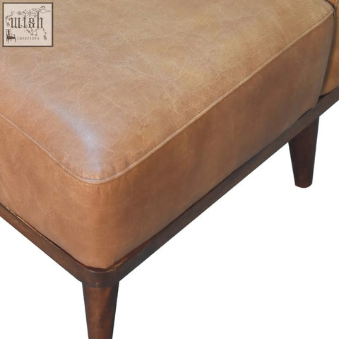 Tan buffalo backrest footstool in tan leather with solid chestnut mango wood legs for stylish comfort